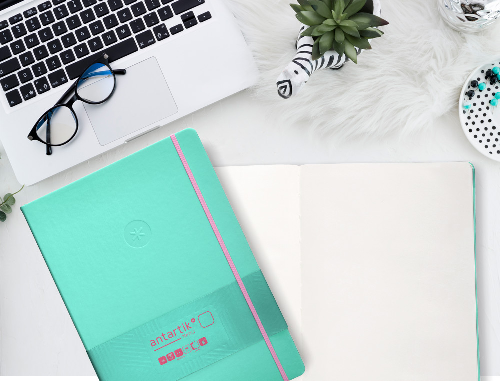 CUADERNO CON GOMILLA ANTARTIK NOTES TAPA DURA A4 HOJAS LISAS ROSA Y TURQUESA 100 HOJAS 80 GR FSC